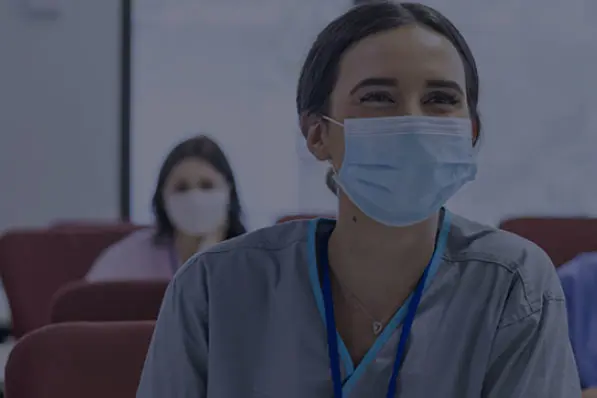 A nurse in a lecture listening