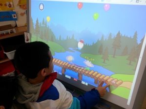 child watching a screen