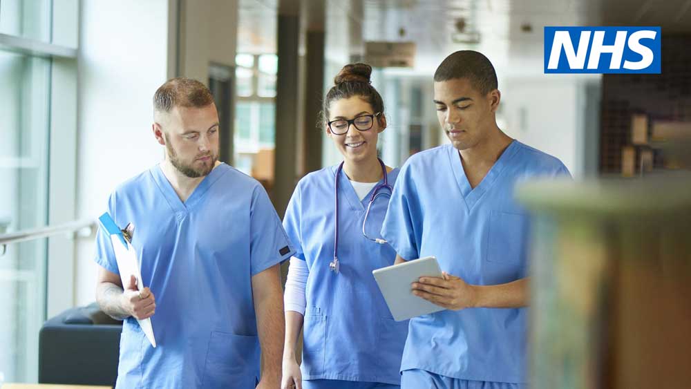 group of doctors walking in hospital