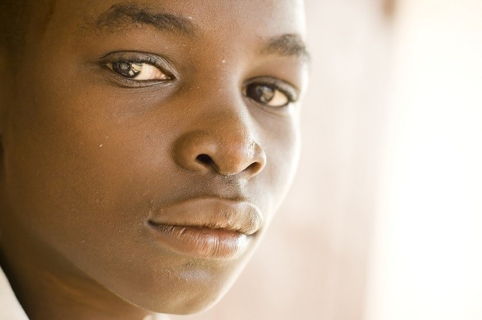 African American boy staring at the camera